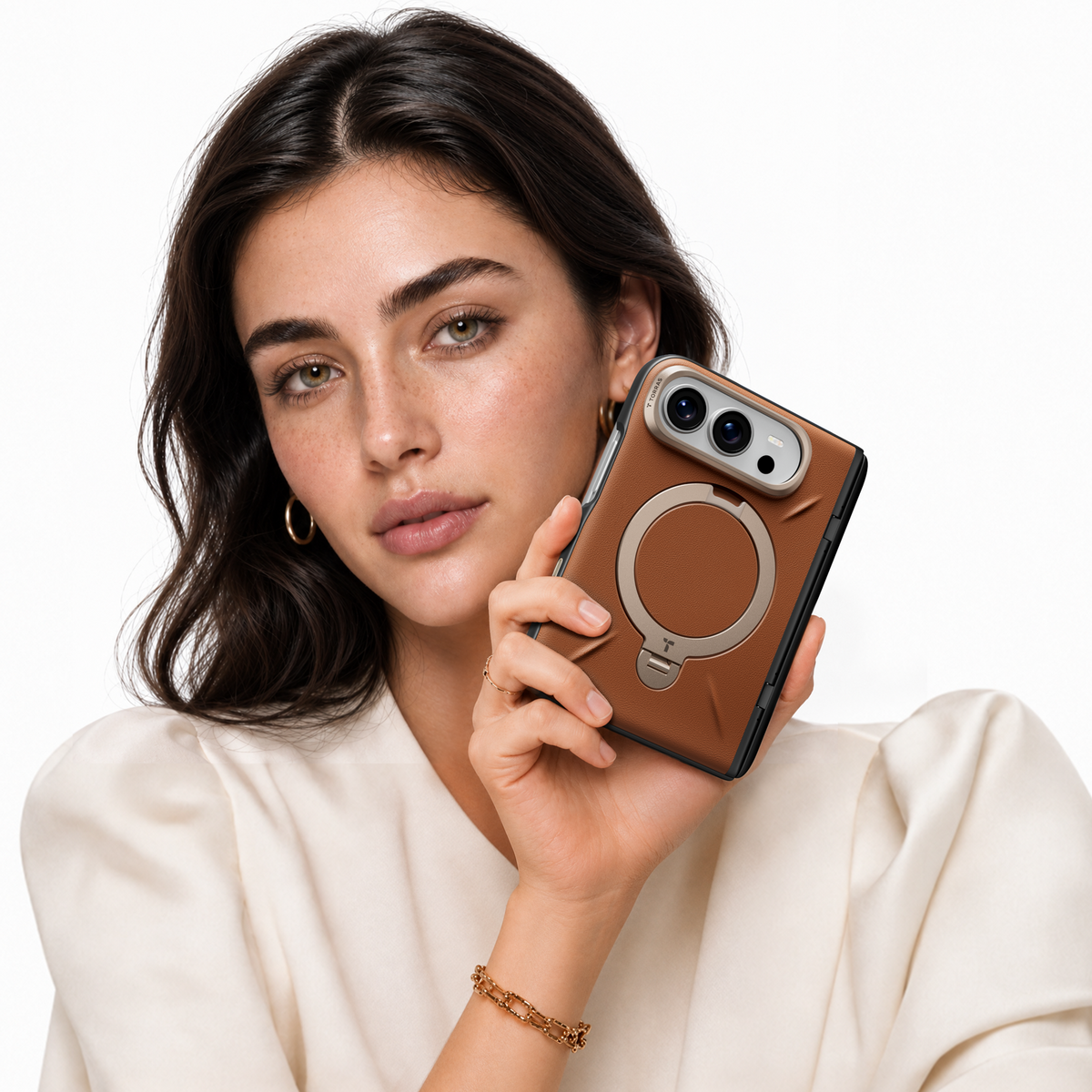 TORRAS campaign portrait with a brown ringstand case